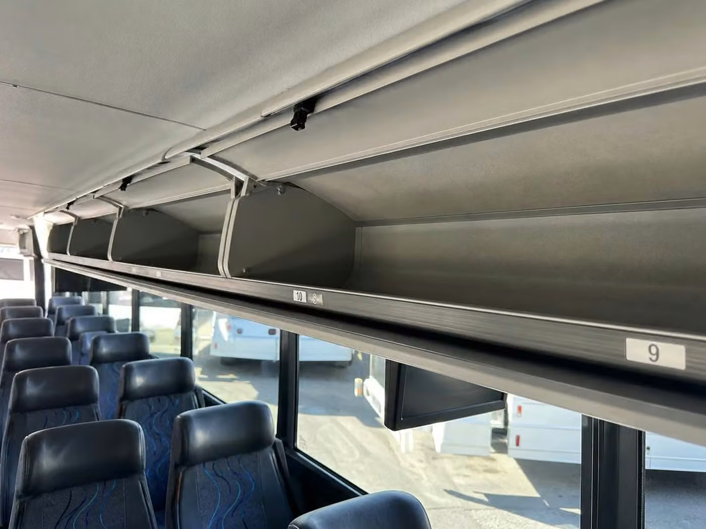 benton 18 passenger minibus overhead storage