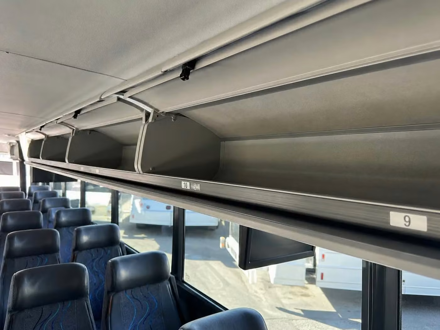 benton 25 passenger minibus overhead storage