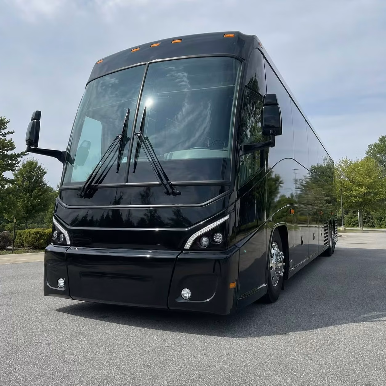 benton 56 passenger charter bus rental